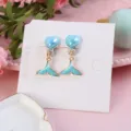 Kids clip-on earrings with cute mermaid tail and blue heart design, perfect for daily wear. - Mermaid Skirt