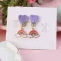 Kids cute clip-on earrings featuring purple glitter heart and colorful rainbow cloud lovely charms. - Rainbow
