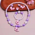 Kids unicorn jewelry set variant, including pearl bead necklace, bracelet, earrings and ring. - Purple Pony 5-Piece Set / Clear Bag Packaging / Purple