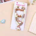 Kids beaded jewelry set with unicorn pendant, pearl necklace, bracelet, ring, and bow earrings. - Milky Coffee Unicorn 5-Piece Set (With Paper Card)