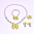 Kids pearl necklace bracelet ring clip-on earrings set with cute yellow bows for girls. - 5-Piece Set (Transparent Bag) / Turmeric