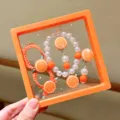 Kids orange pearl bracelet hair tie set, cute princess style cartoon accessories variant. - Orange