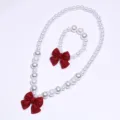 Kids white faux pearl necklace bracelet set with sweet red bow, cute girl dress-up jewelry. - 2-Piece Set (Transparent Bag) / Red