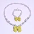 Kids pearl necklace and bracelet set with yellow bow, sweet jewelry accessory for girls. - 2-Piece Set (Transparent Bag) / Turmeric