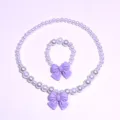 Kids pearl necklace bracelet set with sweet purple bow accessories for girls dress up. - 2-Piece Set (Transparent Bag) / Purple