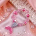 Kids pink beaded bracelet with cute glitter mermaid tail pendant, sweet princess jewelry gift. - Pink Fishtail Bracelet