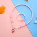Detailed view of children shell beaded necklace and bracelet set with marine style. - No. 2 Conch 2-Piece Luminous Necklace Set (Polybagged)