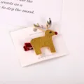 Detail shot of cute Christmas glitter reindeer hair clip with silver antlers and red nose. - Golden Elk, 1 Piece