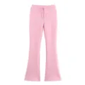 Vue détaillée du pantalon rose évasé décontracté avec une taille à cordon ajustable. - S / Bas / Rose