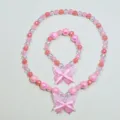 Kids pink beaded necklace bracelet set with cute bow butterfly pendants for sweet little girls variant - Butterfly Necklace 2-Piece Set / Clear Bag Packaging / Pink