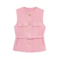 Pink tweed vest detail featuring elegant gold buttons, chic chest pockets and a stylish belt. - Pure Pink