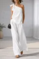 Detailed view of white one shoulder sleeveless top and wide leg pants set with elegant tie. - S / White