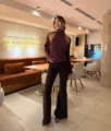 Detailed view of women autumn knitwear set featuring halter cut out top and matching flare pants. - One Size / Set / Coffee