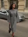 Detailed view of women's cozy gray crewneck knitted midi dress with stylish drawstring waist. - Dark Gray