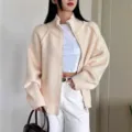 Women's beige full zip knit cardigan jacket, casual loose knitwear top for autumn and winter. - One Size / Apricot