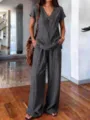 Summer casual two-piece set for women featuring a V-neck top and wide-leg solid trousers. - Black