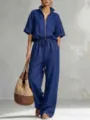Close-up detail of the stylish navy blue linen casual matching set worn by model outdoors. - S / Top And Bottom / Navy Blue