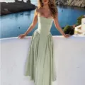 Detail view of this elegant light green strapless corset midi dress featuring a stylish waist design. - Light Green
