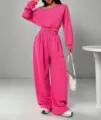 Detailed view of the stylish pink long sleeve crop top and wide leg sweatpants loungewear. - S / Top And Bottom / Rose Red