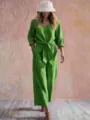 Green V-neck casual tie waist jumpsuit with three quarter sleeves for stylish spring vacation wear. - Verdant