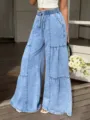 Detail view of womens light blue acid wash wide leg denim pants with elastic drawstring waist. - XS / Bottoms / Light Blue