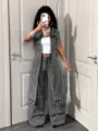 Casual sleeveless long denim vest paired with white crop top and wide-leg jeans outfit detail. - S / Tops / Gray