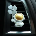 Cute astronaut car air freshener with clover propeller, perfect vehicle vent decor item. - Hands Down Astronaut Gray Windmill