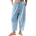 Gros plan sur le pantalon décontracté bleu clair ample avec cordon à la taille et poches. - Bleu clair
