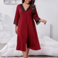 Details of the long sleeve V-neck nightgown with elegant black lace trim in bedroom scene. - XL / Dresses / Red