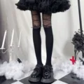 Black gothic lace-up bow pantyhose detail, sheer strap tights close-up display style. - One Size / Black