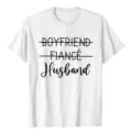 Detailed view of the white cotton graphic t-shirt featuring boyfriend fiance husband text print. - S / Tops / White