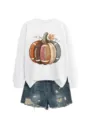 Detailed view of white crewneck sweatshirt featuring creative football pumpkin graphic. - S / Tops / White