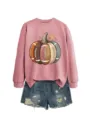 Detail view of women autumn crewneck sweatshirt featuring creative football pumpkin graphic. - S / Tops / Rose Gold