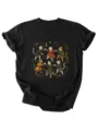 Gedetailleerde close-up van het zwarte t-shirt met korte mouwen en retro kattenprint. - S / Tops / Zwart