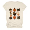 Close-up detail of vintage Halloween graphic print on beige short sleeve t-shirt fabric. - S / Tops / Sand