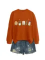 Felpa girocollo a maniche lunga con stampa di articoli d'arte e pantaloncini di jeans strappati. - Taglia S / Top / arancio bruciato