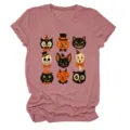 Vintage Halloween graphic tee with nine retro spooky character icons. Soft crew neck short sleeve. - S / Tops / Rose Gold