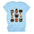 Light blue short sleeve t-shirt featuring vintage halloween graphic prints for women casual wear - S / Tops / Light Blue