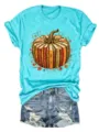 Damen türkis Kurzarm T-Shirt mit kreativem Herbst Kürbis Buch Grafikprint und Jeansshorts. - Blaugrün