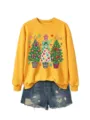 Nahaufnahme des gelben Sweatshirts mit festlichem Weihnachtsbaum-Grafikdruck Detail. - S / Oberteile / Gelb