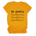 Casual geel T-shirt met korte mouwen en inspirerende bedrukte tekst voor dames. - S / Tops / Mosterdgeel (Zwart Lettertype)