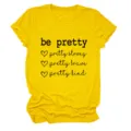 Dames casual t-shirt met ronde hals en korte mouwen met inspirerende grafische opdruk geel. - S / Tops / Geel (Zwart Lettertype)