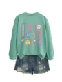 Radiology X-ray themed long sleeve sweatshirt paired with denim shorts, casual autumn women wear. - S / Tops / Light Green