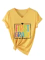 Gros plan sur le t-shirt jaune a col en V et manches courtes avec imprime first grade. - S / Hauts / Jaune