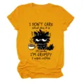 Casual women's mustard yellow short sleeve t-shirt featuring a funny grumpy cat coffee print. - S / Tops / Mustard Yellow (Black Text)