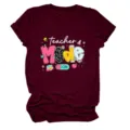 Close-up detail of the maroon short sleeve t-shirt featuring fun teacher graphic print. - S / Tops / Wine Red (White Letters)