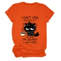Casual funny women's orange short sleeve t-shirt with cute grumpy cat and coffee print. - S / Tops / Orange (Black Text)