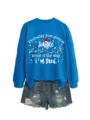 Detailed view of the blue long-sleeve sweatshirt with festive holiday slogan graphic. - S / Tops / Lake Blue (White Print)