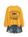 Women's yellow crewneck long sleeve sweatshirt with funny Christmas letter print and blue shorts. - S / Tops / Yellow