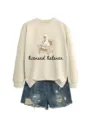Casual cute cartoon duck graphic crewneck sweatshirt paired with stylish denim shorts for women. - S / Tops / Sand